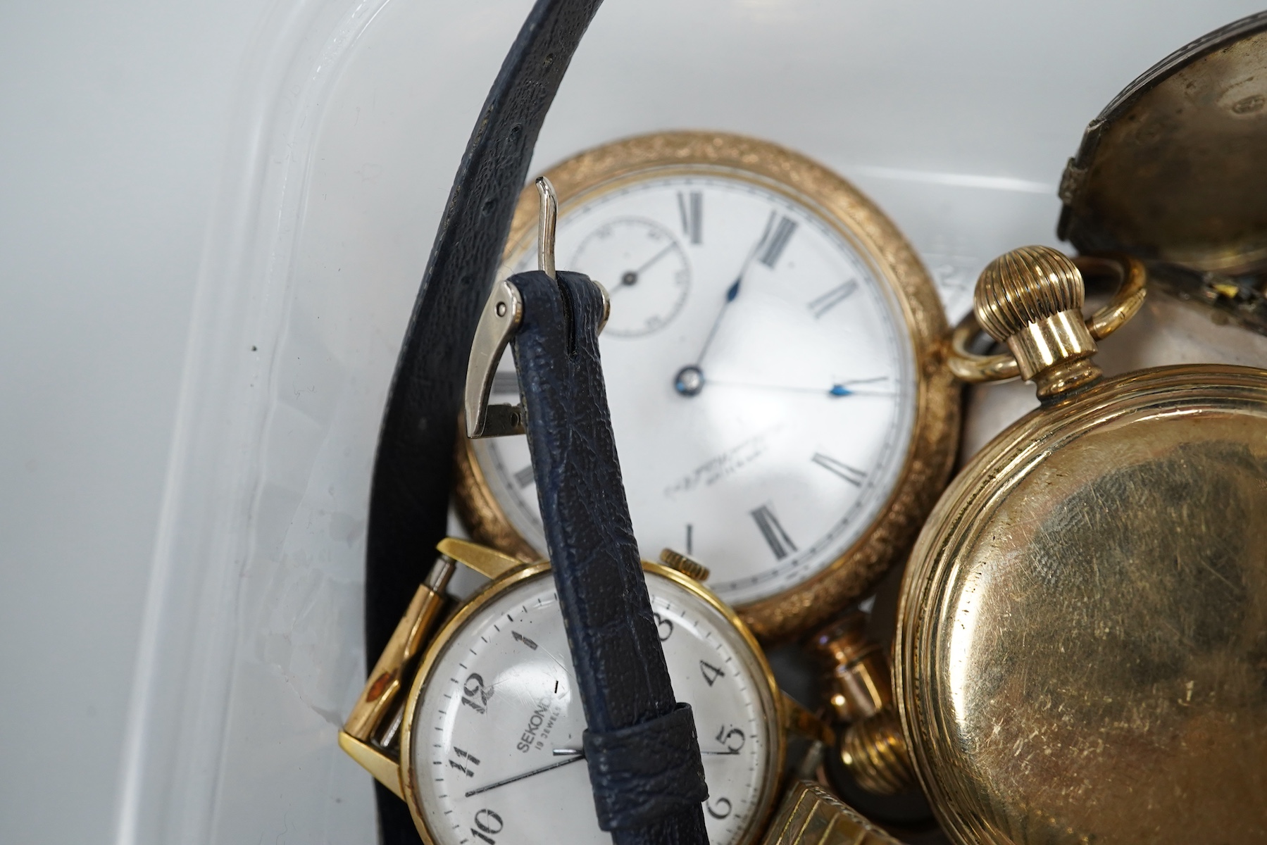 Seven assorted pocket and fob watches including a gold plated hunter by Thomas Russell & Son and an open faced Waltham, together with four other items including three wrist watches.
